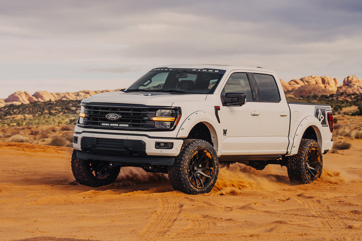 Rocky Ridge Lifted F-150 truck in a desert scene.